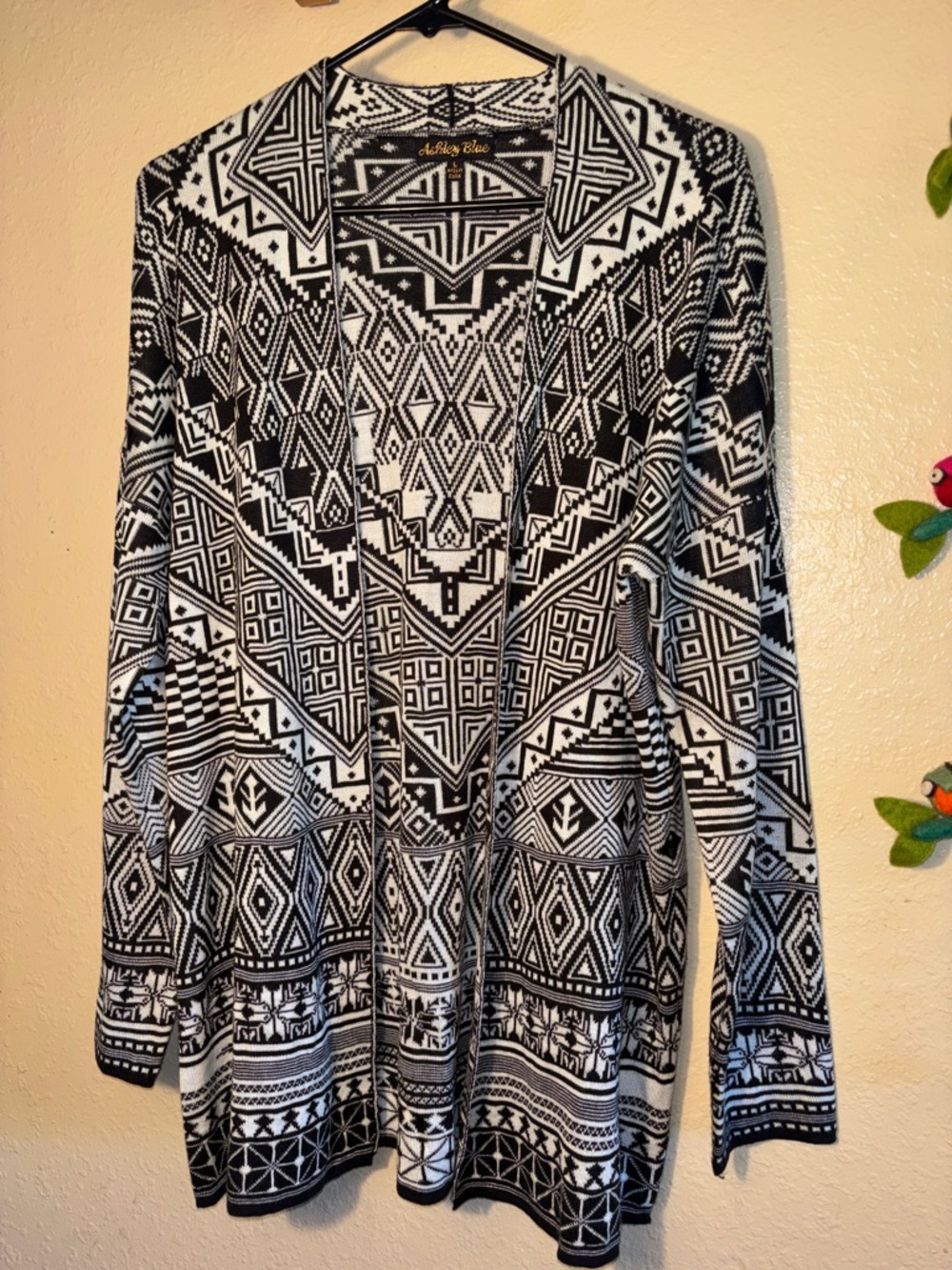 NWOT Ashley Blue open-front cardigan featuring a black and white bold g
